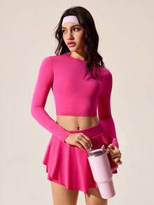 Core Rhythm Áo thun dài tay không đường may, cổ cao, hở lưng, thiết kế vạt xoắn, được thiết kế đặc biệt cho chạy bộ ngoài trời, Pilates và tập luyện tại phòng gym. Chất liệu nhẹ, co giãn, thoải mái, thời trang và gợi cảm. Áo thể thao hở lưng màu hồng, áo tập luyện màu hồng, áo tập gym hở lưng, áo thể thao hở lưng. - Màu Hồng Tươi - Xem 6