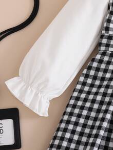 Elladie kids 少女复古法式优雅可爱格纹碎花长袖二合一中长连衣裙，秋冬季节适用。这款连衣裙适合学校、家庭聚会和休闲娱乐。这款连衣裙的设计让少女们看起来充满活力和可爱，为她们增添更多活力。无论是外出还是在温馨的家庭环境中，这款连衣裙都一定会为少女们带来乐趣和活力！ - 黑與白 - 查看 6