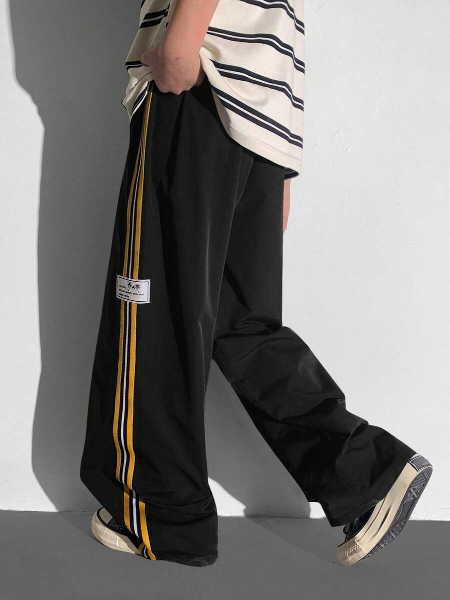 SHEIN Tween Boys' Casual Versatile Comfortable Colorful Ribbon Letter Woven Label Straight Loose Solid Color Pants, Suitable For Commuting, School, Daily Casual, Travel, Sports, Spring/Summer/Fall/Winter,Thanksgiving,Christmas,Winter,Winter Clothes,Cozy Fall & Winter Styles, - Black - View 1