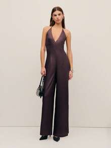 Nöista Bộ jumpsuit màu nâu này có thiết kế cổ chữ V sâu và ống quần rộng, mang đến vẻ thanh lịch vượt thời gian. Được làm từ chất liệu satin mềm mại, đây là lựa chọn hoàn hảo cho bữa tối Lễ Tạ ơn, trang phục sinh nhật hoặc các sự kiện trang trọng. Một điểm nhấn nổi bật trong tủ đồ mùa xuân của phái nữ. - Màu tím - Xem 4