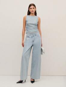 Nöista 这款灰色亮片上衣采用无袖设计，带有微妙的闪光，在光线下熠熠生辉。柔软弹力的面料带来舒适感和时尚感，使其成为春假派对、女性生日庆祝活动或女士春假系列中优雅之选的理想之选。 - 綠色 - 查看 4