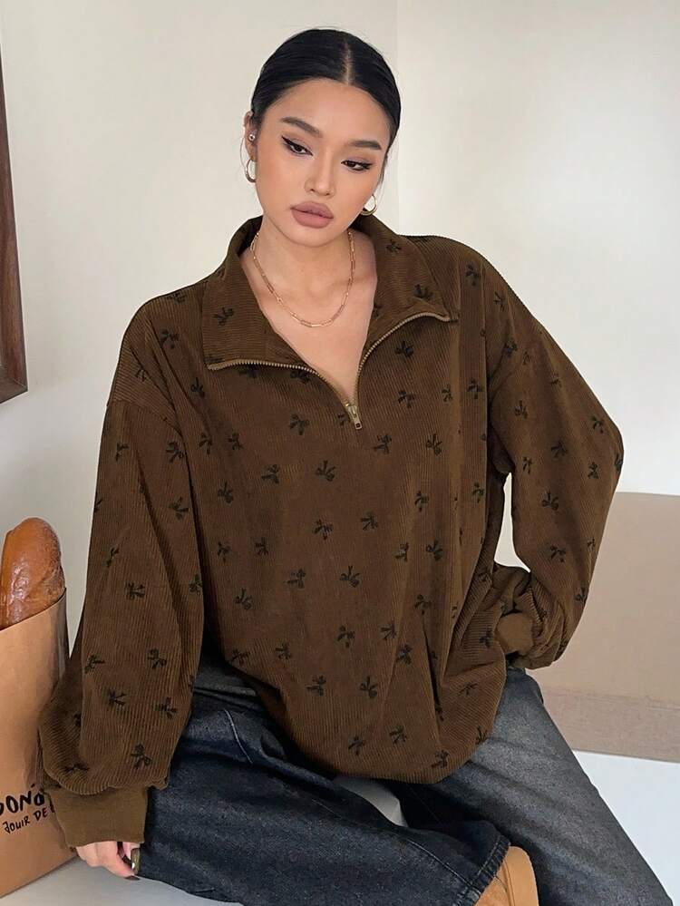 Dazy Plus Plus Size Women Half-Zip Sweatshirt With Bow Print, Loose Fit Streetwear Style