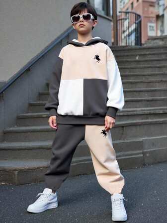 SHEIN مجموعة ملابس منزلية مريحة للفتى المراهق 2 قطعة، تتميز بألوان متباينة وأنماط رياضية وكلاسيكية، هوديي بأكمام طويلة، مناسبة للخريف/الشتاء