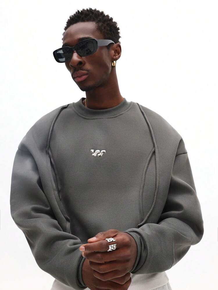 로고 디테일이 있는 오버사이즈 솔기 스웨트셔츠