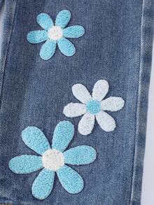 年轻女孩时尚雪花水洗做旧刺绣喇叭牛仔裤