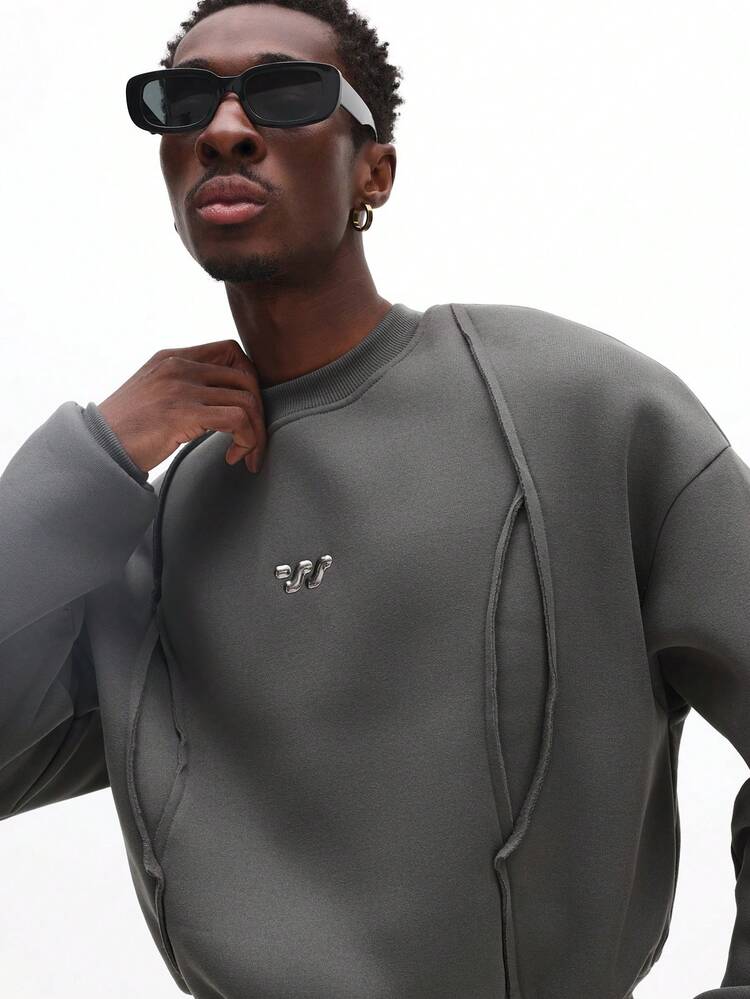 로고 디테일이 있는 오버사이즈 솔기 스웨트셔츠