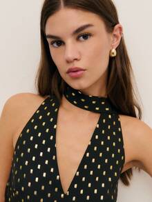 Nöista 这款别致的黑色上衣饰有金色点缀，采用挂脖领口和钥匙孔前襟设计，尽显大胆精致的气质。无论是生日派对、优雅庆典，还是春假外出，它都是女士春假穿搭系列中的亮点之选。 - 黑色 - 查看 5