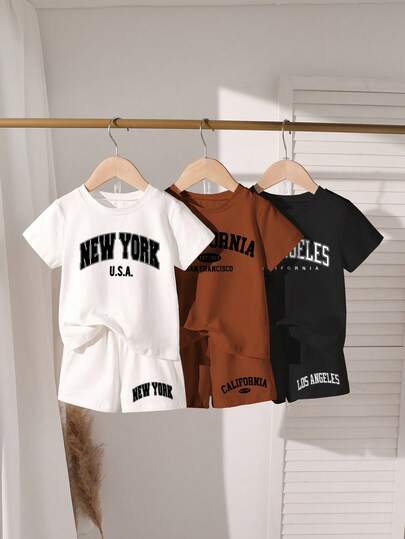 SHEIN Explorewe Conjunto casual de 6 piezas para niños pequeños: 1 camiseta de manga corta con cuello redondo y estampado de letras y 1 pantalón corto en blanco, 1 en marrón, 1 en negro