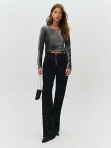 Nöista 高腰喇叭裤，前片和侧缝处饰有金属铆钉。采用简洁的腰带和外露拉链设计，结构感十足，外观大胆流畅，带有复古气息。 - 黑色 - 查看 5