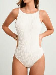 CAJUNI Solid Textured Sleeveless Criss-Cross Backless Slip Bodysuit, Beige Swimsuit, Modest One Piece Swimsuit, Cream One Piece Swimsuit, Ribbed One Piece Swimsuit, Textured Swimsuit, Summer Bodysuit - White - View 1