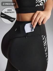 Innovista Conjunto deportivo de mujer con estampado animal clásico, top corto y leggings, de estilo reflectante y que brilla en la oscuridad, para correr de noche, entrenamiento, actividades al aire libre, ejercicio, ciclismo y uso diario. Diseño ligero, transpirable y funcional con detalles de malla y aberturas, ideal para entrenamientos, cardio y actividades en el gimnasio o al aire libre. - Negro - Ver 2