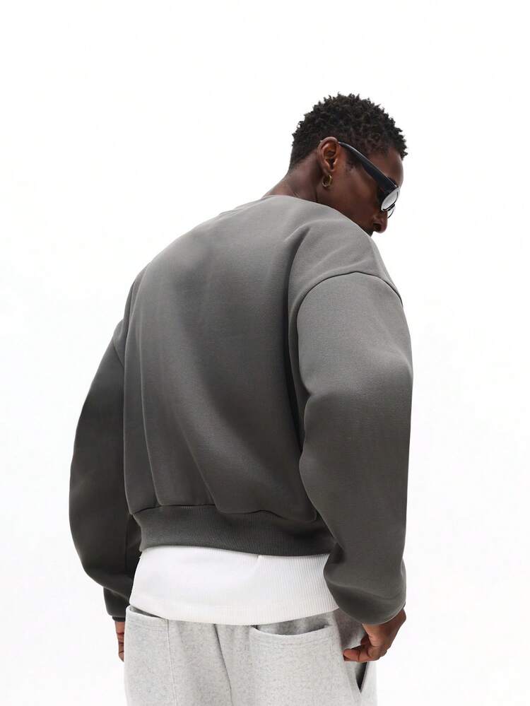 로고 디테일이 있는 오버사이즈 솔기 스웨트셔츠