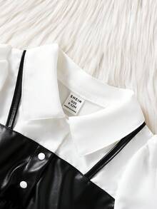 SHEIN Playful Pals 女婴领口泡泡袖二合一A字裙。经典A字廓形，适合各种体型的宝宝。独特的领口设计增添一丝正式感，巧妙的泡泡袖设计则甜美俏皮。二合一设计营造视觉深度。无论是外出还是休闲居家，这款连衣裙都能展现宝宝活泼可爱的天性。 - 黑色 - 查看 8