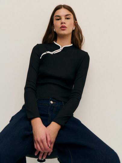 Nöista Elegante blusa negra de manga larga con detalles únicos en el cuello; una opción elegante y sofisticada en ropa de invierno para mujer para salidas nocturnas o looks de fiesta. Perfecta para Acción de Gracias, Navidad o Año Nuevo