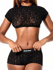 SUMWON WOMEN Mock Neck Short Sleeve Mesh Crop Top With Geometric Cutout Pattern For Lounge Wear