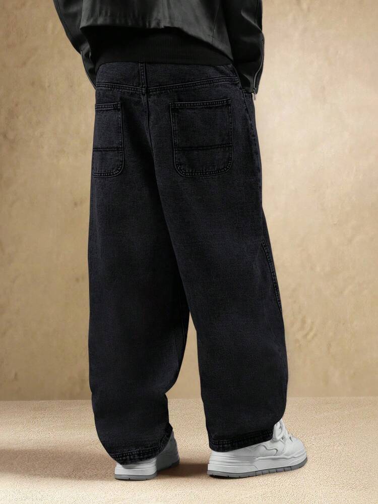 Calça Denim larga com bolsos aplicados e lavagem