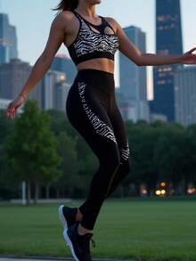 Innovista Conjunto deportivo de mujer con estampado animal clásico, top corto y leggings, de estilo reflectante y que brilla en la oscuridad, para correr de noche, entrenamiento, actividades al aire libre, ejercicio, ciclismo y uso diario. Diseño ligero, transpirable y funcional con detalles de malla y aberturas, ideal para entrenamientos, cardio y actividades en el gimnasio o al aire libre. - Negro - Ver 11