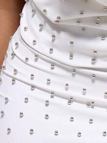 MUSERA Spódnica mini z niskim stanem i ćwiekami, dopasowana, tylko na jesień i zimę, na wieczorne wyjście, elegancka, seksowna, świąteczna, imprezowa, na okazję, premium, na nowy rok