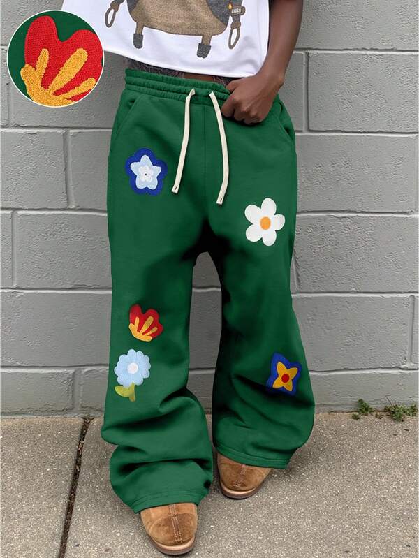 Manfinity EMRG Men's Casual Graphic Print Drawstring Loose Sweatpants Sweatpants Patched Flower Pants Flare Sweatpants Green Sweatpants Graphic Sweatpants