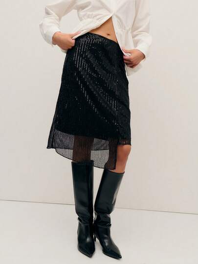 Nöista This Black Skirt Sparkles With Delicate Sequin Detailing And Features A Soft Draped Side For An Elegant Finish. Perfect For Spring Break Outfits Nights, Birthday Outfits For Women Clothes Parties, Or Elegant Events, It Adds A Refined Shine To Women's Spring Break Outfits Clothes Collections.