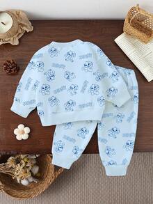 Set de 2 piezas de sudadera y pantalones a juego con estampado de conejo de dibujos animados lindo para niñas jóvenes, azul océano, conjunto casual cómodo para otoño/invierno - Multicolor - Ver 2