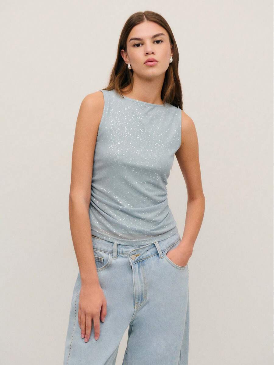 Nöista 这款灰色亮片上衣采用无袖设计，带有微妙的闪光，在光线下熠熠生辉。柔软弹力的面料带来舒适感和时尚感，使其成为春假派对、女性生日庆祝活动或女士春假系列中优雅之选的理想之选。 - 綠色 - 查看 1