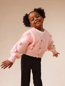 SUMWON Chaqueta de punto corta con botones rosa para niñas, con pompones en forma de corazón y mangas largas - Rosa Pálido - Ver 1