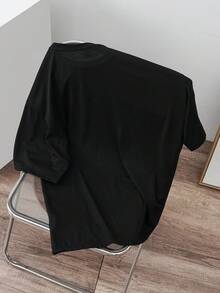 Manfinity Joysei Áo thun dệt kim tay ngắn cổ tròn in họa tiết tối giản dành cho nam - màu đen - Xem 2