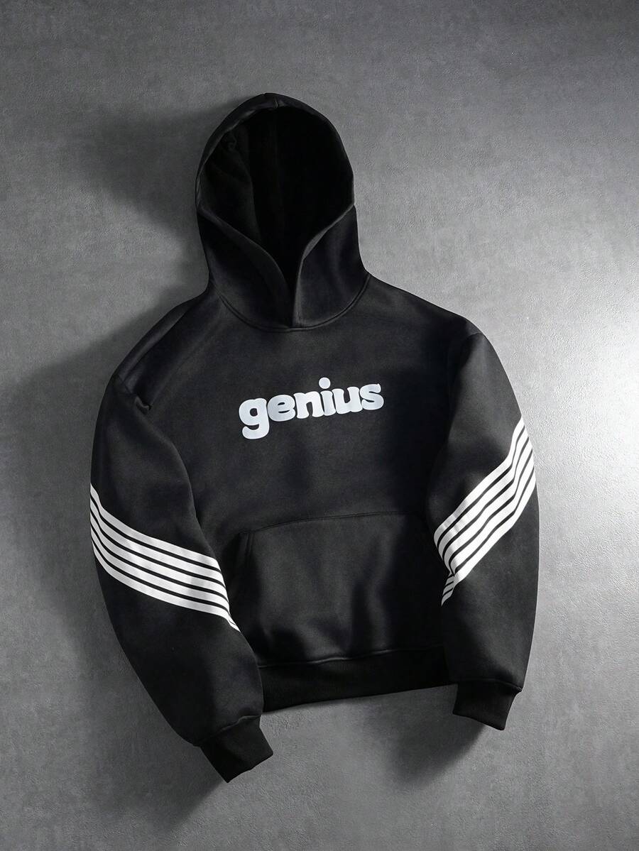 Manfinity Roghcode sweat-shirt à capuche casual pour hommes avec patchwork, rayures et graphique lettrage sur poche, sweat-shirt à capuche gothique graphique noir automnal à manches longues - Noir - Voir 1