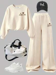 SHEIN 2 件套青少年女孩针织宽松字母和心形印花保暖内衬圆领运动衫和阔腿裤套装，秋冬 - 杏色 - 查看 1