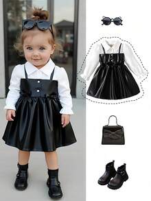 SHEIN Playful Pals 女婴领口泡泡袖二合一A字裙。经典A字廓形，适合各种体型的宝宝。独特的领口设计增添一丝正式感，巧妙的泡泡袖设计则甜美俏皮。二合一设计营造视觉深度。无论是外出还是休闲居家，这款连衣裙都能展现宝宝活泼可爱的天性。 - 黑色 - 查看 4