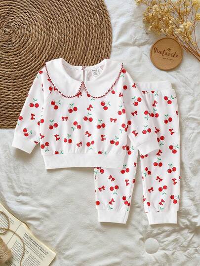 SHEIN 2 件套女婴韩版休闲樱桃蝴蝶结印花长袖翻领花卉针织卫衣和花卉印花裤套装，时尚百搭，可爱甜美