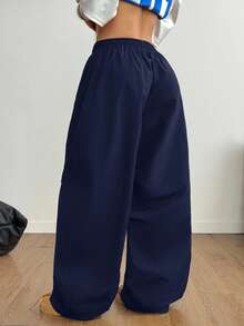 Coolane 女士和男士夏季节日情侣同款复古运动服刺绣图案格子 Corta Vento 纹理宽松降落伞弯刀裤 - 藏蓝色 - 查看 8