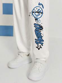 SHEIN 2 件套青少年男孩休闲街头时尚酷炫赛车涂鸦印花连帽衫和运动裤套装，适合通勤、上学、休闲外出、运动、秋冬 - 白色 - 查看 13