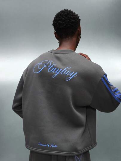 PLAYBOY X SUMWON Crop Fit Long Sleeve Side Tape Crew Neck Sweatshirt With Script Back Print And Striped Sleeve Details