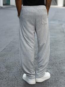 Manfinity Hypemode Pantalones de chándal grises casuales para hombres jóvenes con bolsillo grande y parche, pantalones de chándal grises, pantalones de chándal clásicos, pantalones largos de sudadera, pantalones de sudadera para hombre, pantalones de chándal grises para hombre, ropa de otoño/invierno para hombres