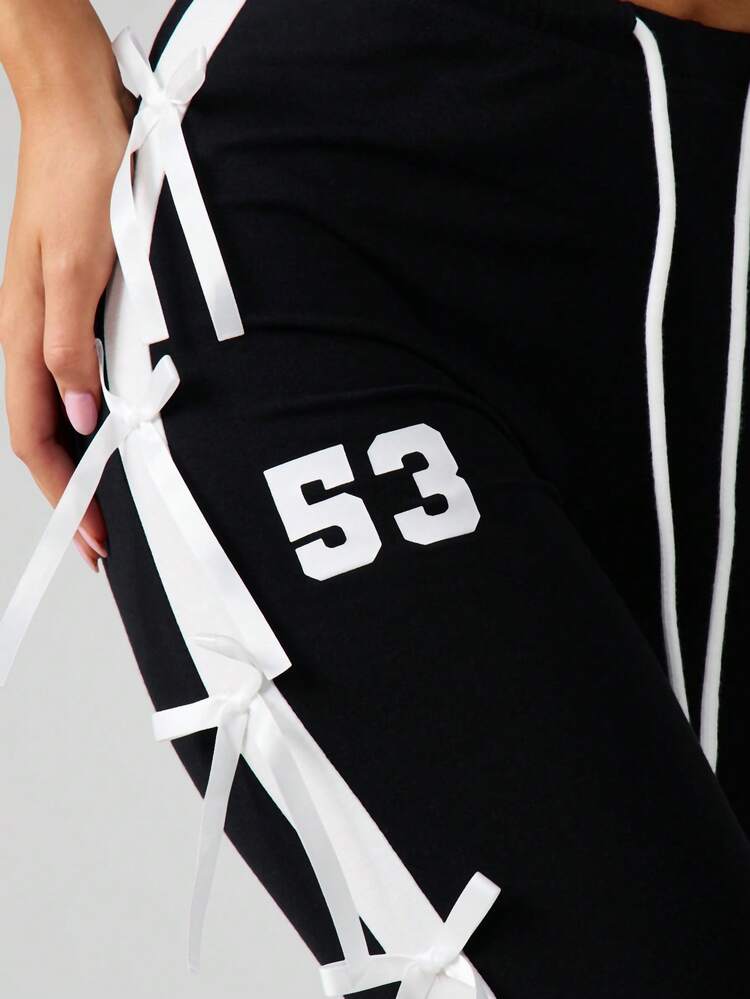 Missguided x Playboy Damskie szorty Capri z kokardką, sznurowaniem z boku i nadrukowanym logo