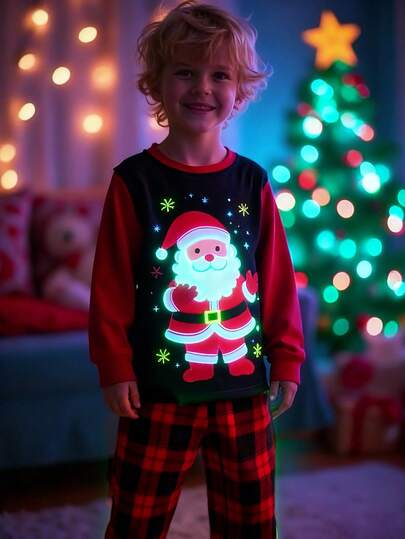 Conjunto de pijama navideño de 2 piezas con top negro para niños y pantalón a cuadros rojos, con estampado gráfico de Papá Noel que se ilumina, de tela de punto a cuadros rojos cómoda y elástica