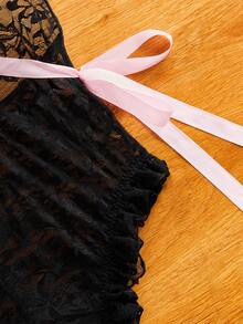 FairyFlirt Damen Kontrast-Farbige Schleife Spitze Patchwork Trägerjumpsuit - Schwarz - Übersicht 10