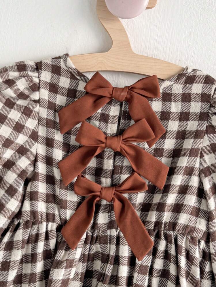 brown gingham dress with bows Cozy Pixies Baby Girl Colorblock Bow Decor Round Neck Brown Plaid Long  Sleeve Waist Cinched Dress, Versatile & Comfortable