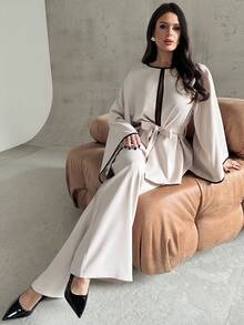 Firerie Conjunto elegante minimalista de mujer para uso diario, compuesto por un cárdigan de cuello redondo con volantes en contraste de color albaricoque y negro, de manga larga, y pantalones rectos sueltos. Nuevo conjunto elegante de dos piezas para otoño/invierno, atuendo para maestras, uso al aire libre