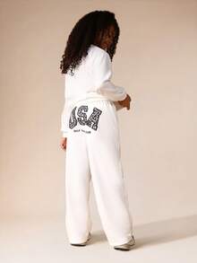 SUMWON Conjunto de sudadera con capucha y pantalón de chándal para niñas con estampado de leopardo y texto "USA" para uso casual en el hogar - Blanco - Ver 2