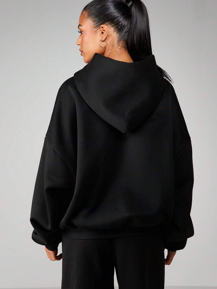 MISSGUIDED Oversized Hooded Sweatshirt With Front Pocket And Bold Logo Print For Casual Comfort