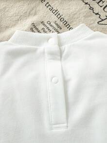 SHEIN Playful Pals Robe en maille mignonne et douce pour bébé fille avec décoration de fleurs en fourrure 3D, convient pour les occasions de printemps/automne comme les sorties, les vacances, les fêtes. Style polyvalent pour l'automne