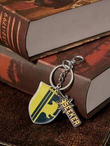 HARRY POTTER X SHEIN 1 pezzo Portachiavi in metallo alla moda con grafica di tasso e lettera da 20 mm - Multicolore - Visualizzare 2