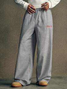 AXEPEAK Pantalones rectos casuales de hombre con cintura elástica, estampado de rayas y parches, para uso diario, escuela, otoño - Blanco y Negro - Ver 3