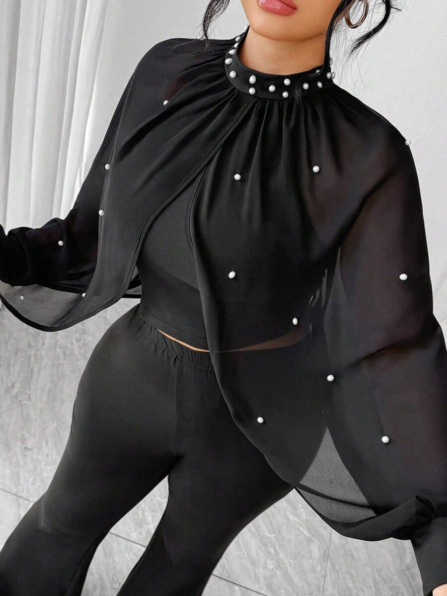 Elenzga Conjunto de dos piezas de talla grande para mujer, compuesto por una blusa de cuello alto ajustada con parches de malla y cuentas, emparejada con pantalones holgados de pierna acampanada, un conjunto elegante y sofisticado cómodo para uso diario y fiestas - Negro - Ver 1