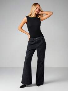 MISSGUIDED Pantalones vaqueros de pierna ancha con estampado de leopardo y campana, pantalones de mezclilla con estampado animal, pieza de moda de declaración - Negro - Ver 5