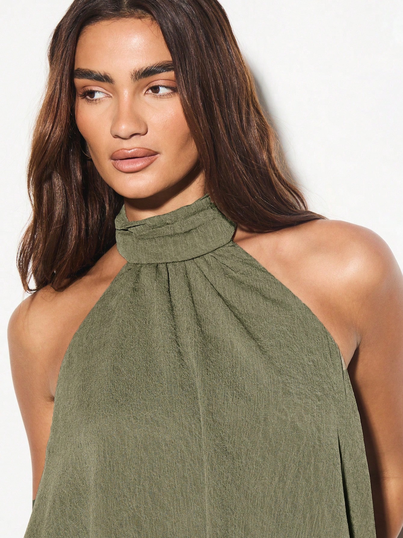 KIZN Top drappeggiato asimmetrico con scollo all'americana e orlo asimmetrico