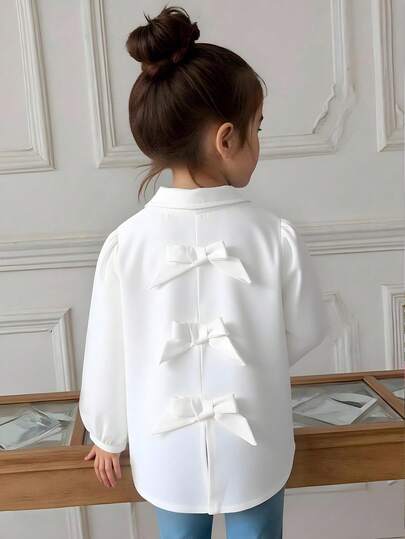 女童休闲时尚经典条纹梭织衬衫，背面饰有可爱蝴蝶结，宽松舒适，适合春夏秋冬、日常、通勤、户外、派对、拍照